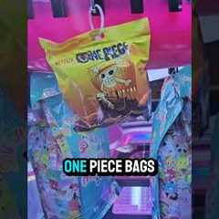 Poke it to win it, fun new arcade game with mystery bags! #arcade #onepiece #demonslayer #blindbag